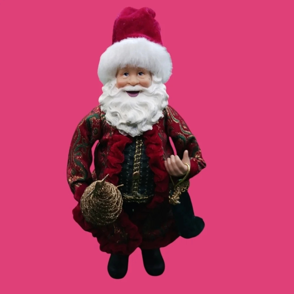 Vintage santa holding gold tree and boot